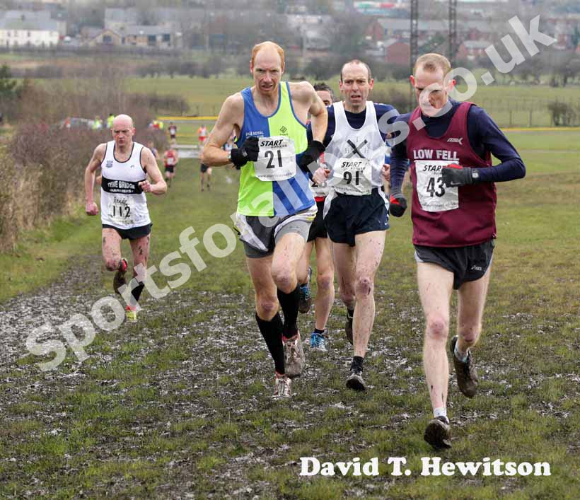 Chasing the leader 21 Stuart Doyle (Vale Royal AC), 91 Ben Raymonds (Thames Hare and Hounds) and 43 Jonathan Archer (Low Fell), BMAF Cross Country, Herrington, Sunderland.
